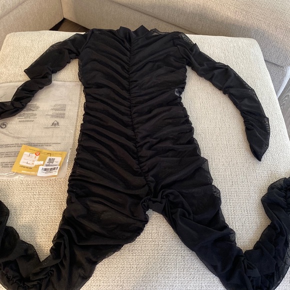 Women's black sheer outfit size medium. Outfits is stretchy & zips in the back - Picture 1 of 2